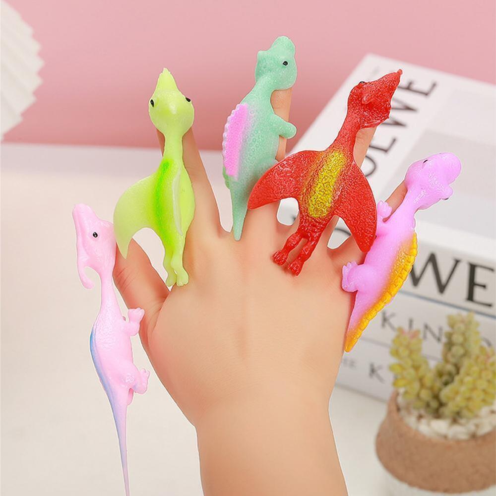 Sling shot Dinosaur Finger Toy Catapult Toy Elastic Flying Finger Dinosaur #T