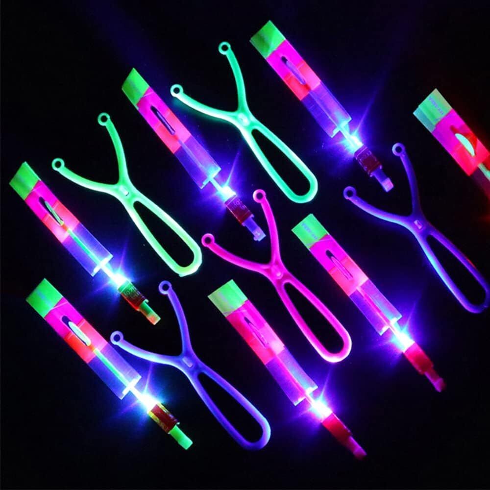 30X Amazing Led Light Arrow Flying Toy Kids Elastic Slingshot Flying Copters