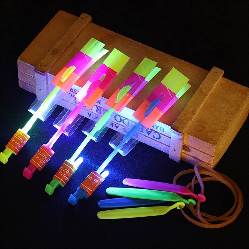 30X Amazing Led Light Arrow Flying Toy Kids Elastic Slingshot Flying Copters