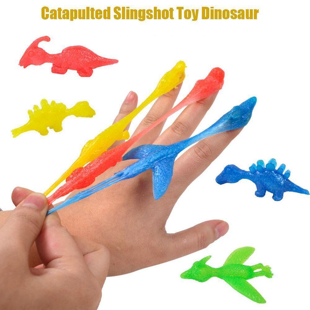 Sling shot Dinosaur Finger Toy Catapult Toy Elastic Flying Finger Dinosaur #T